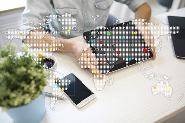 Worlds maps on virtual screen. Business, internet and technology concept.