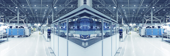 Blue toned, blurred collage of as if typical industrial space. Concept of manufacturing and...