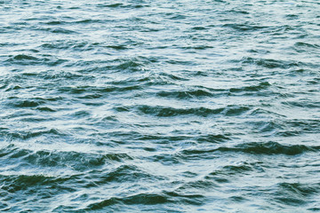 Low view on sea waves. Water background.