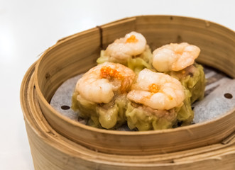 Dim Sum, traditional Cantonese dumplings, cooked in bamboo steamer