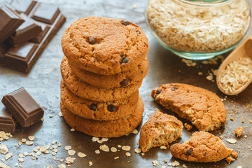 Home freshly baked oatmeal and chocolate chips cookies on cooling rack. Healthy snack for Breakfast