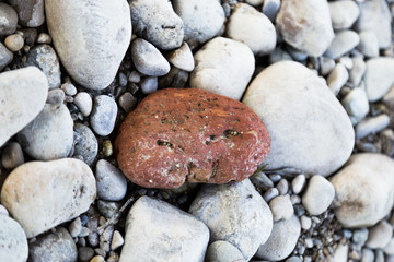 red stone at the river
