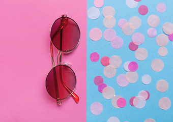 Beautiful trendly sunglasses on a pink background