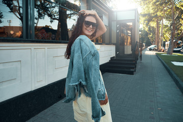 Obraz premium Portrait of carefree lady spending vacation in Europe