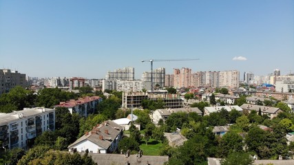 Fototapeta premium Buildings from the height. Park from the height. Park. Trees. Architecture.