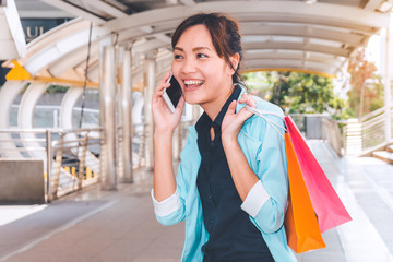 Happy woman with shopping bags enjoying in shopping. women shopping, lifestyle concept