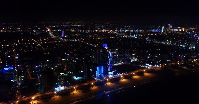The night coast of Danang city from the height of a bird's flight.