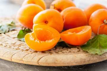Apricots on a wooden tray