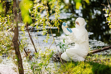 biologist working on water analysis. Ecology and environmental pollution concept.