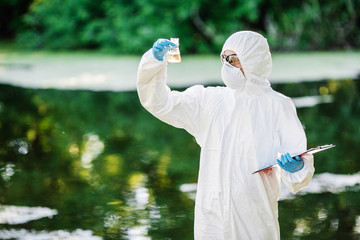 biologist working on water analysis. Ecology and environmental pollution concept.