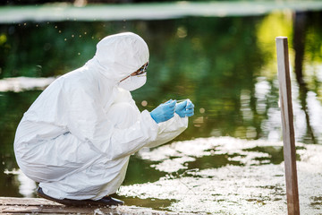 biologist working on water analysis. Ecology and environmental pollution concept.