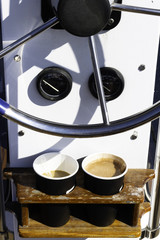 Sailing yacht control wheel and implement, helm, coffee