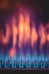 Close-up of colorful gas flame burning