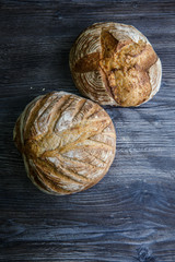 two delicious whole homemade round white wheat bread