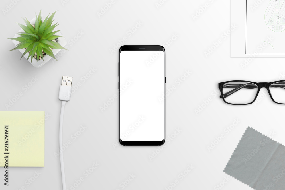 Poster modern smart phone with round edges on white desk. isolated screen for mockup.