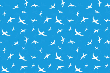 white seagull birds flying against blue sky seamless background