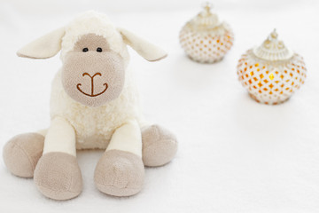 Greeting card on white background. Eid Al Adha sacrifice festival, Islamic Arabic candle and sheep