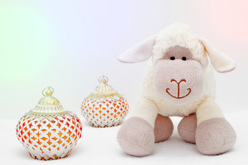 Greeting card on white background. Eid Al Adha sacrifice festival, Islamic Arabic candle and sheep