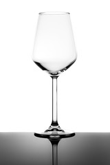 Empty Wine Glass and Reflection Isolated on White