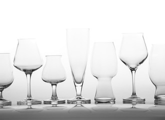 Alignment of All Kind of Beer Glass over White