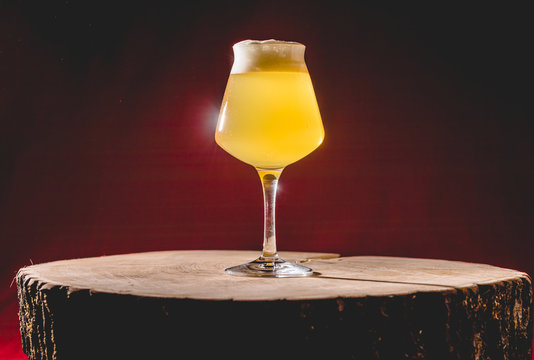 Wood Barrel Aged Lambic Beer in Teku Glass.