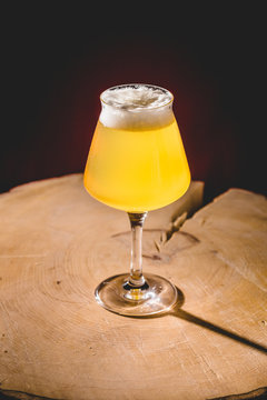 Wood Barrel Aged Lambic Beer in Teku Glass.