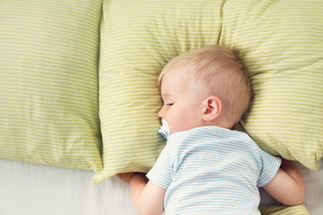 One year old baby in the bed