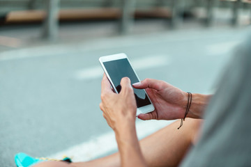 Woman with mobile phone, sport and workout
