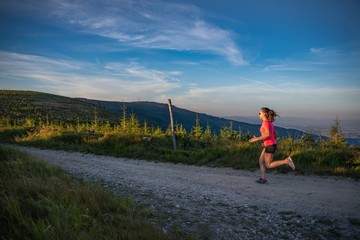 Woman running in mountains