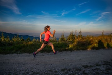 Woman running in mountains