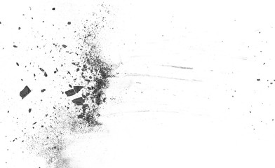 Fototapeta na wymiar Black powder explosion, charcoal dust texture isolated on white background