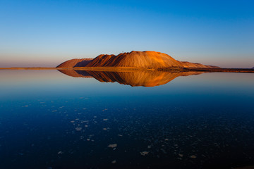 Huge potassuim waste mountain at sunset in Soligorsk