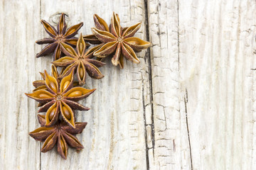 Fototapeta premium star anise on wooden background