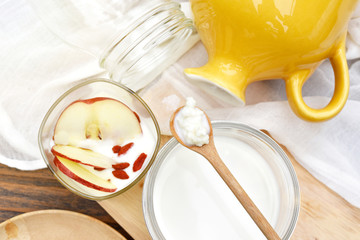 Kefir milk, Close up of hand holding kefir grains, Healthy fermented food, Probiotic nutrition drink for good balance digestive system.