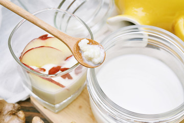 Kefir milk, Close up of hand holding kefir grains, Healthy fermented food, Probiotic nutrition drink for good balance digestive system.