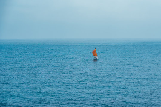Sailboat on the middle of the ocean
