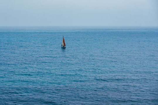 Sailboat on the middle of the ocean