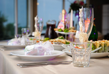 Luxury banquet table setting in restaurant close-up