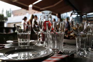 empty clean glasses stand on the table.