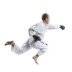 A man in black gloves beats with a hand in a jump isolated