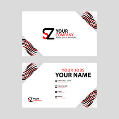 Horizontal name card with decorative accents on the edge and bonus SZ logo in black and red.