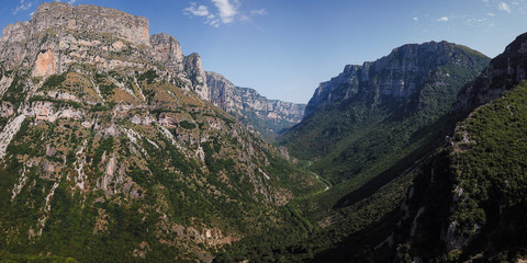 Fototapeta na wymiar The Vikos Gorge in northern Greece is listed as the deepest gorge in the world by the Guinness Book of Records. The gorge is found in Vikos–Aoös National Park.