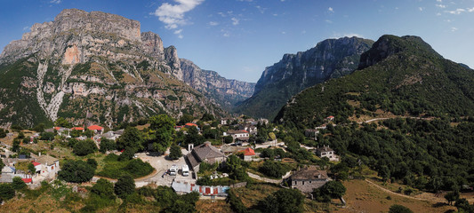 Naklejka premium The Vikos Gorge in northern Greece is listed as the deepest gorge in the world by the Guinness Book of Records. The gorge is found in Vikos–Aoös National Park.