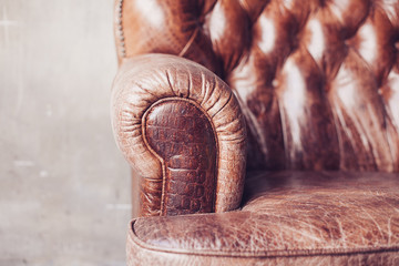 Closeup texture of vintage brown leather sofa