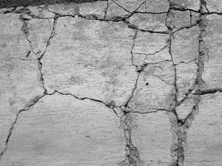 Cracked concrete texture closeup background