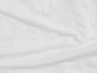 Crumpled white fabric cloth texture