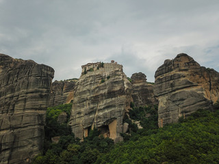 The Meteora is a rock formation in central Greece hosting one of the largest and most precipitously built complexes of Eastern Orthodox monasteries. It is included on the UNESCO World Heritage List.