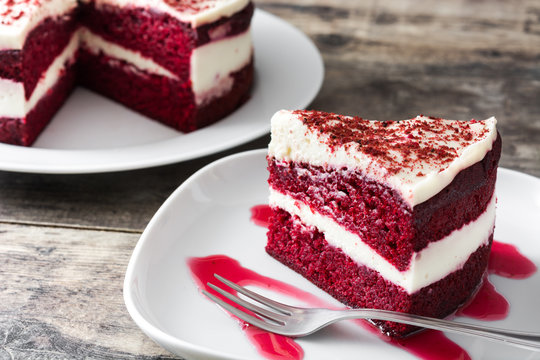 Red Velvet Cake Slice On Wooden Table