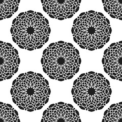 Seamless pattern with abstract flowers. Fashion textile print. Asian fabric background. Vector monochrome design. Perforation floral holes.