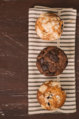 Fresh different homemade muffins on the table